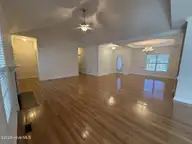 103 Castelnau Court, Jacksonville, NC 28540 — 5-bedroom home in Williamsburg Plantation, Jacksonville, NC, photo 7 of 52: 6. Living Room AA