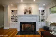 1996 Hoods Creek Drive, New Bern, NC 28562 — 3-bedroom waterfront home, New Bern, NC, photo 20 of 70: Fireplace & Built-in Shelving