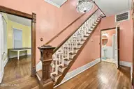 601 W Main Street, Elizabeth City, NC 27909 — 4-bedroom home, Elizabeth City, NC, photo 11 of 44: 601 Angled view of staircase and front h