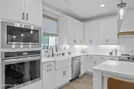 524 Moss Lake Lane, Holly Ridge, NC 28445 — 5-bedroom waterfront home in Summerhouse On Everett Bay, Holly Ridge, NC, photo 11 of 71: 45_kitchen