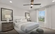 530 Glitter Bay Loop, Shallotte, NC 28470 — 3-bedroom home in Solserra, Shallotte, NC, photo 11 of 30: Guest Bedroom