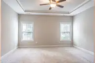 255 Champions Ridge Drive, Southern Pines, NC 28387 — 3-bedroom home in Mid South Club, Southern Pines, NC, photo 17 of 56: Master Bedroom
