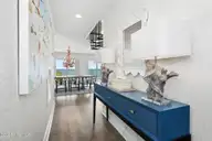 7313 Ocean Drive, Emerald Isle, NC 28594 — 5-bedroom waterfront home in Oakland Hills, Emerald Isle, NC, photo 23 of 66: Hallway to Dining Area