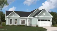 1042 Rock Skipper Road, Ocean Isle Beach, NC 28469 — 3-bedroom home in The Tides at Ocean Isle Beach, Ocean Isle Beach, NC, photo 1 of 34: Front Elevation
