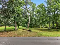 9088 56 Forest Drive SW, Sunset Beach, NC 28468 — lot in Bonaparte Retreat II, Sunset Beach, NC, photo 1 of 28: primary