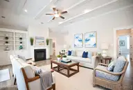 6391 Bryson Drive SW, Ocean Isle Beach, NC 28469 — 4-bedroom home in Retreat At OIB, Ocean Isle Beach, NC, photo 21 of 71: Staged Family Room