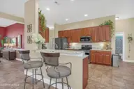 1226 Atrium Way, Leland, NC 28451 — 3-bedroom waterfront home in Waterford of the Carolinas, Leland, NC, photo 16 of 61: Kitchen
