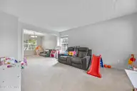 4918 Split Rail Drive, Wilmington, NC 28412 — 3-bedroom home in Johnson Farm, Wilmington, NC, photo 24 of 49: 24_family room