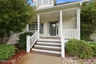 112 White Heron Lane, Swansboro, NC 28584 — 3-bedroom waterfront home in Bluewater Cove, Swansboro, NC, photo 3 of 60: front porch - Copy