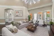 1614 Colonist Square SW, Ocean Isle Beach, NC 28469 — 3-bedroom home in Brick Landing, Ocean Isle Beach, NC, photo 7 of 63: Living room staged
