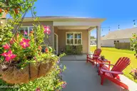 1728 Culdees Lane SE, Bolivia, NC 28422 — 3-bedroom home in Avalon, Bolivia, NC, photo 4 of 57: back patio