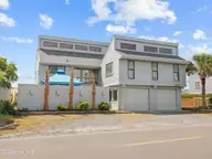 2604 S Shore Drive, Surf City, NC 28445 — 4-bedroom waterfront home in Channelbend, Surf City, NC, photo 1 of 73: Front