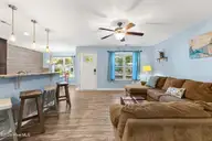117 NE 19th Street, Oak Island, NC 28465 — 3-bedroom home in Tranquil Harbor, Oak Island, NC, photo 7 of 77: Living Room