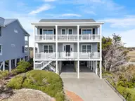 708 Ocean Boulevard W, Holden Beach, NC 28462 — 4-bedroom waterfront home in Bacon Island Harbor, Holden Beach, NC, photo 2 of 49: 708OceanBlvdW - 2