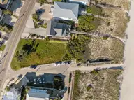 402 1 Fort Fisher Boulevard N, Kure Beach, NC 28449 — waterfront lot in Kure Dunes, Kure Beach, NC, photo 13 of 55: 19-web-or-mls-DJI_20251022160103_0936_D