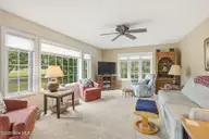 105 Laurel Court, Pine Knoll Shores, NC 28512 — 3-bedroom home in Piksco, Pine Knoll Shores, NC, photo 18 of 64: Family room