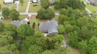 132 42 Quail Woods Drive, New Bern, NC 28560 — lot in Quail Woods Village, Ltd, New Bern, NC, photo 4 of 6: 12-web-or-mls-DJI_20260511130325_0365_D