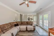 673 Morris Landing Road, Holly Ridge, NC 28445 — 3-bedroom home in The Preserve At Morris Landing, Holly Ridge, NC, photo 15 of 76: Living room
