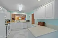 300 Sunset Oaks Lane 4, Sunset Beach, NC 28468 — 3-bedroom townhome in Sunset Oaks Garden Homes, Sunset Beach, NC, photo 13 of 44: Kitchen
