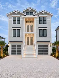 17 Grand View Drive, Ocean Isle Beach, NC 28469 — 6-bedroom waterfront home in The Pointe at Ocean Isle Beach, Ocean Isle Beach, NC, photo 1 of 25: Exterior