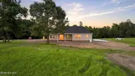 446 Pointe Vista Drive, Elizabeth City, NC 27909 — 4-bedroom waterfront home in The Waters At Sunset Pointe, Elizabeth City, NC, photo 13 of 47: 001_DJI_20260824171531_0506_D_013