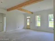 203 Gaston Drive, Elizabeth City, NC 27909 — 3-bedroom waterfront home in Newbegun Land, Elizabeth City, NC, photo 4 of 18: Greatroom to hall view