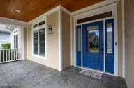402 Cornubia Drive, Castle Hayne, NC 28429 — 3-bedroom home in River Bluffs, Castle Hayne, NC, photo 2 of 77: Cornubia402-2fprchShaneL33A4554 copy - C