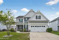 745 Heartwood Drive, Winnabow, NC 28479 — 5-bedroom home in Mallory Creek Plantation, Winnabow, NC, photo 2 of 49: Front