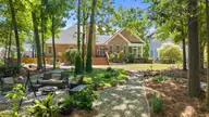 1547 Grandiflora Drive, Leland, NC 28451 — 5-bedroom home in Magnolia Greens, Leland, NC, photo 19 of 22: 50_dji_20260416123143_0019_d