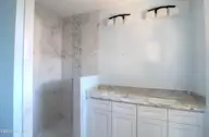6926 Beach Drive SW, Ocean Isle Beach, NC 28469 — 3-bedroom home in Pine Acres, Ocean Isle Beach, NC, photo 9 of 12: Master Bath