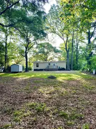 407 Maple Street SW, Shallotte, NC 28470 — 2-bedroom manufactured home in Lakewood Estates, Shallotte, NC, photo 22 of 26: looking from the rear of property