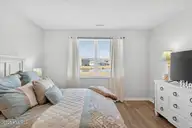 1271 Rippling Cove Loop SW, Supply, NC 28462 — 3-bedroom waterfront home in Stanbury Creek, Supply, NC, photo 17 of 53: Primary Bedroom