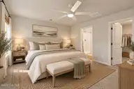 5256 Soybean Drive NE, Winnabow, NC 28479 — 3-bedroom home in Country Walk, Winnabow, NC, photo 24 of 43: Warm Neutral Bedroom Retreat