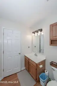 319 Riggs Road, Hubert, NC 28539 — 3-bedroom home in Huntington Marsh, Hubert, NC, photo 23 of 68: Hallway full bathroom