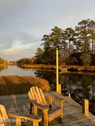 266 Ennett Lane, Sneads Ferry, NC 28460 — 3-bedroom waterfront home, Sneads Ferry, NC, photo 23 of 37: Dock at Sunset