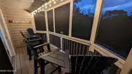 3030 Marsh Winds Circle Unit 106, Southport, NC 28461 — 2-bedroom waterfront condo in St James, Southport, NC, photo 22 of 36: Back Porch