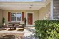 1104 Crestfield Way, Leland, NC 28451 — 3-bedroom home in Windsor Park, Leland, NC, photo 2 of 49: Oversized Front Porch