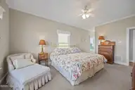 1711 E Fort Macon Road, Atlantic Beach, NC 28512 — 4-bedroom waterfront home in Asbury Beach, Atlantic Beach, NC, photo 19 of 42: Primary Suite Sound view