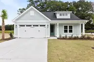 2058 Greenside Manor Drive SW, Ocean Isle Beach, NC 28469 — 4-bedroom home in The Greenside Manors, Ocean Isle Beach, NC, photo 1 of 53: 2058 Greenside Manor Drive