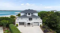 5 Oyster Catcher Road, Wilmington, NC 28411 — 4-bedroom waterfront home in Figure Eight Island, Wilmington, NC, photo 1 of 56: DJI_0299