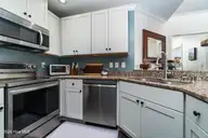 300 Sweetwater Cove, Newport, NC 28570 — 3-bedroom condo in The Coves at Newport, Newport, NC, photo 12 of 40: Kitchen View