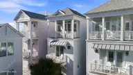 107 W Bogue Boulevard 3, Atlantic Beach, NC 28512 — 2-bedroom home in The Lookouts in The Grove, Atlantic Beach, NC, photo 2 of 38: 14-web-or-mls-DJI_20260908165447_0040_D
