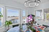 103 E Island Drive, Oak Island, NC 28465 — 3-bedroom waterfront home, Oak Island, NC, photo 16 of 76: 40_dining area