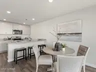 7654 Pennycress Drive 474, Leland, NC 28451 — 4-bedroom townhome in Grayson Park, Leland, NC, photo 18 of 51: 15- similar to dining area and kitchen