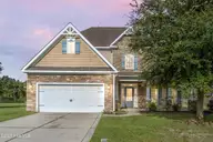 180 River Winding Road, Jacksonville, NC 28540 — 4-bedroom home in The Bluffs On New River, Jacksonville, NC, photo 1 of 60