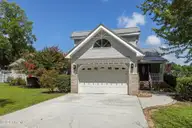 1074 Sea Gate Drive, Newport, NC 28570 — 3-bedroom waterfront home in Sea Gate, Newport, NC, photo 2 of 59: Front