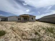 450 Hinton Lane SW 113, Ocean Isle Beach, NC 28469 — 3-bedroom home in Glendale Arbor, Ocean Isle Beach, NC, photo 4 of 30: Back lot 113,
