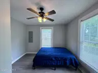 305 E Oak Street, Lake Waccamaw, NC 28450 — 3-bedroom home, Lake Waccamaw, NC, photo 22 of 44: Primary Bedroom