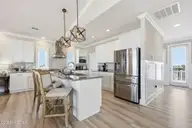 6203 Ocean Drive, Emerald Isle, NC 28594 — 6-bedroom waterfront home in Emerald Isle By The Sea, Emerald Isle, NC, photo 13 of 62: 54-web-or-mls-6203 Ocean Dr 126