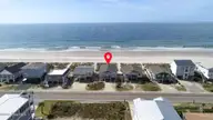 515 W Beach Drive, Oak Island, NC 28465 — 4-bedroom waterfront home, Oak Island, NC, photo 23 of 23: Aerial photos